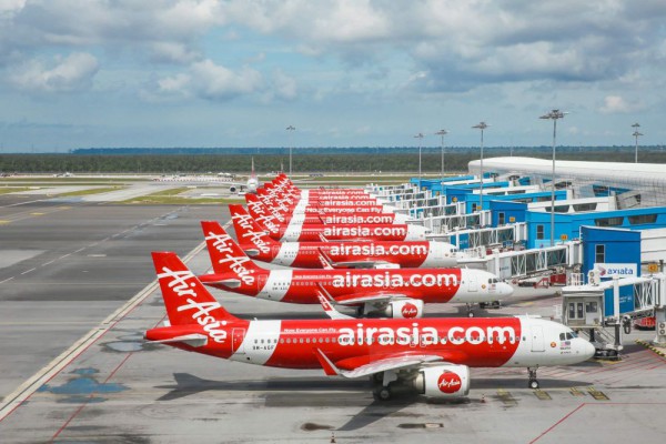 Akuisisi AirAsia Group oleh AirAsia X: Langkah Strategis dalam Industri Penerbangan - Bisnismu